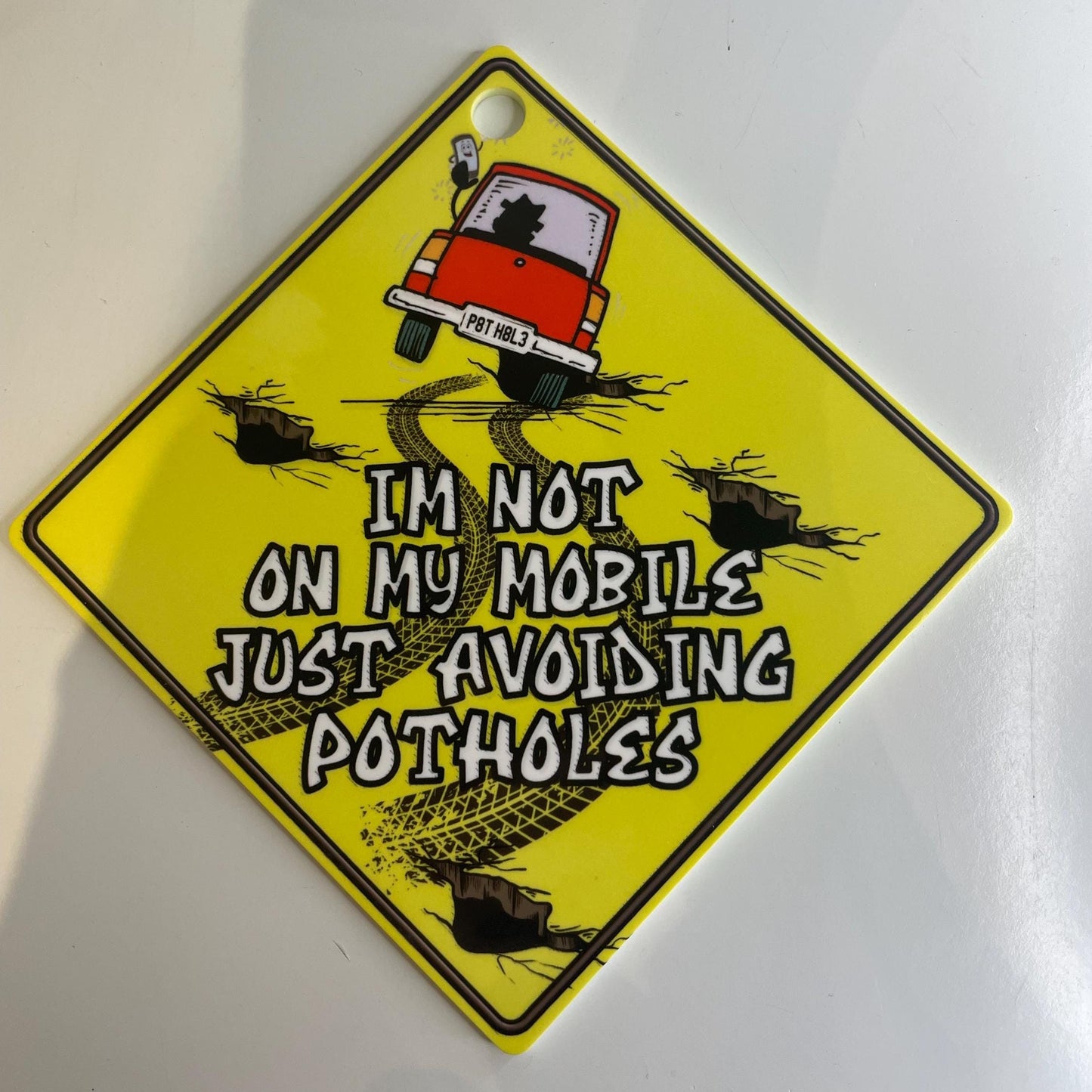 Just Avoiding Potholes Funny Car Sign