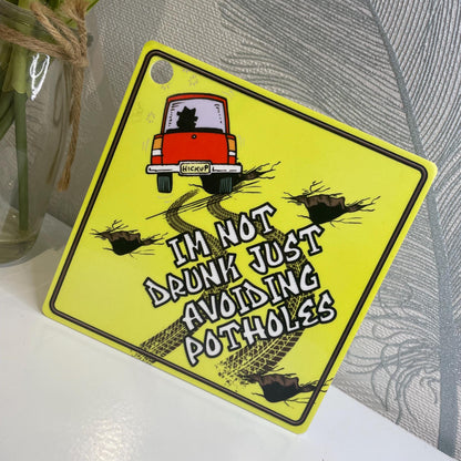 Just Avoiding Potholes Funny Car Sign